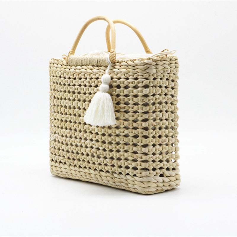 Hollow tassel woven straw bag