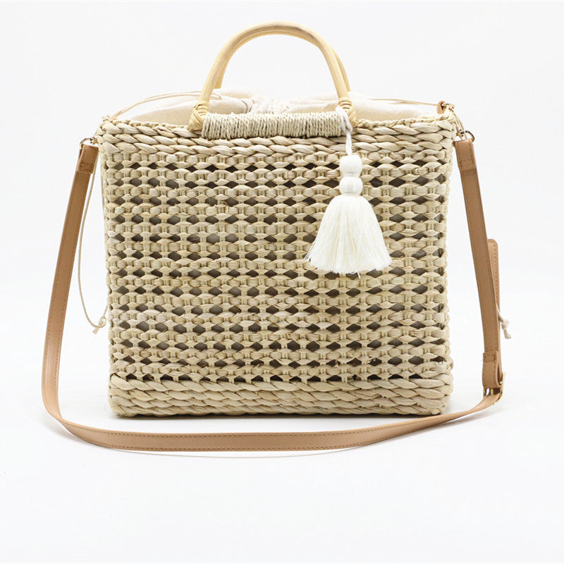 Hollow tassel woven straw bag