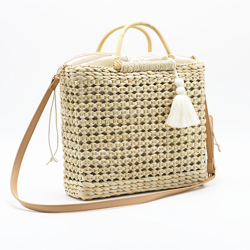 Hollow tassel woven straw bag