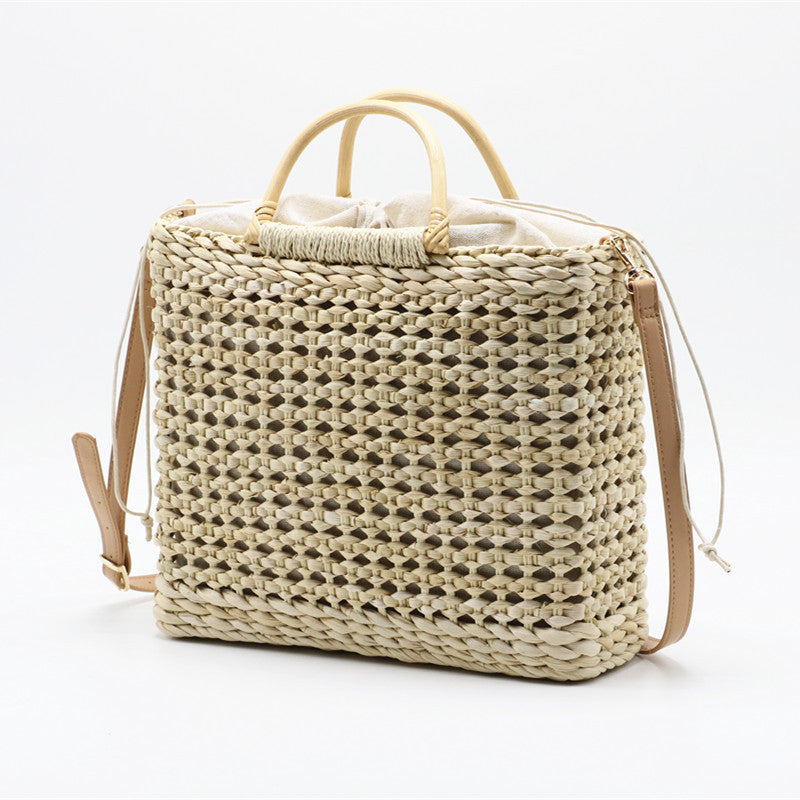 Hollow tassel woven straw bag